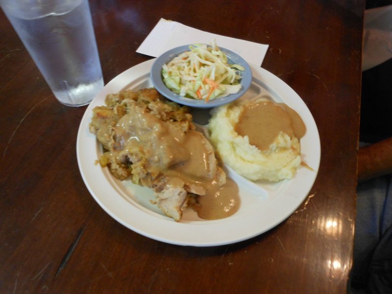 Pork roast and dressing with the fixins'.