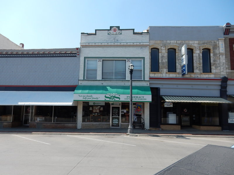 A few store fronts survived the 60's "cover it up with tin"