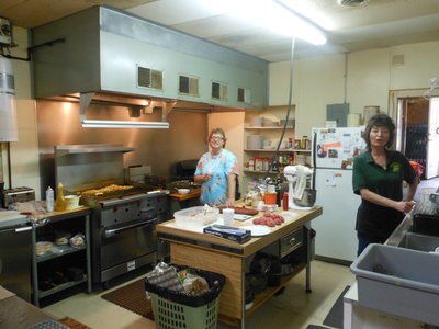 These ladies were hard at work, getting ready to feed the gang.