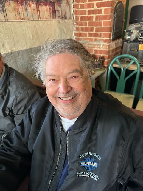Don't you love it when a guy's having a good time.  This is what you look like when you have a homemade cinnamon roll for breakfast.