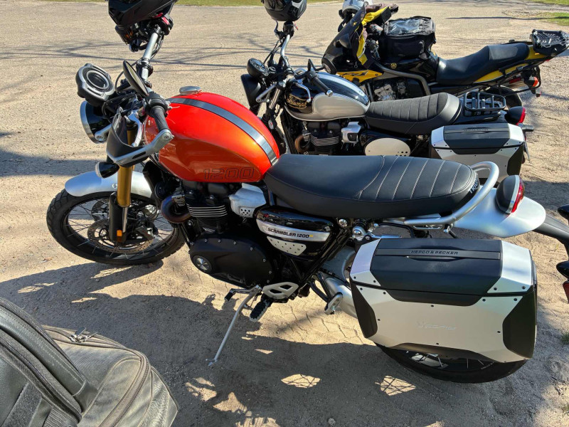 There’s that orange scrambler again ! Our team’s has very nice bikes.