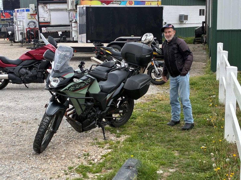 Mike Rowland next to his really sweet Kawasaki Versys 300.