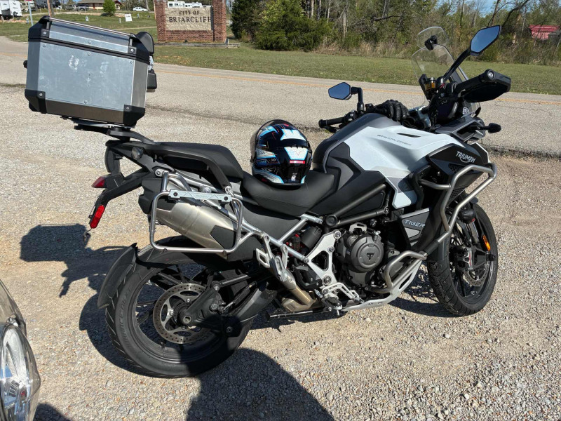 Todd Merryman’s Triumph Tiger .. he wife Michelle has no problem with him having as many bikes as he wants. Same with guns .. top shelf bourbons, etc. He hit the lottery.