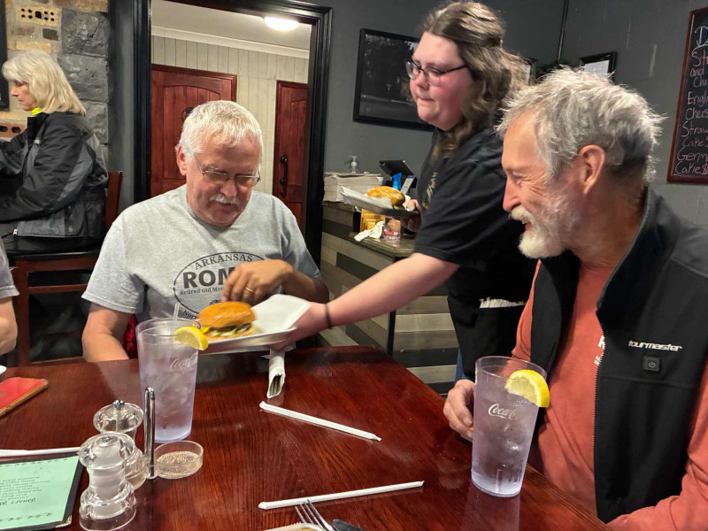 Neil .. let Riley set it down first before you start grabbing at it. It looked quite tasty. Bet you forgot the jalapeños. Neil and I love our food ultra spicy. Easy Jim. Grab another shrimp off my plate until your food arrives.