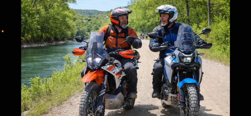 Jim Eickman and Glen Brouwer Riding gravel roads after our delicious Between the Buns lunch. These guys could be brothers .. even twins.