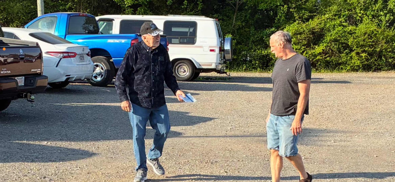 Leo was again trying to sell stuff at our ROMEO gatherings. A form of pan handling. Think he was selling ROMEO stickers. Fred was side stepping away quickly. I give those stickers away for free ! May want to consider starting a Go FundMe page for Leo.