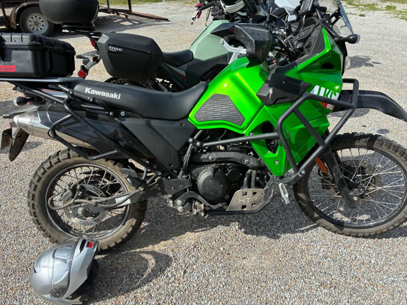 Ok whose KLR is that ?  Ok that one is Ron Letcher’s. Mine is in another pic. Neil rode Ron’s KLR today while Ron rode Neil’s V11 Guzzi. There are now talks of them doing an even trade. Neil LOVES the KLR. He said if they do trade .. he will probably raise the KLR seat height another 2-3 inches.