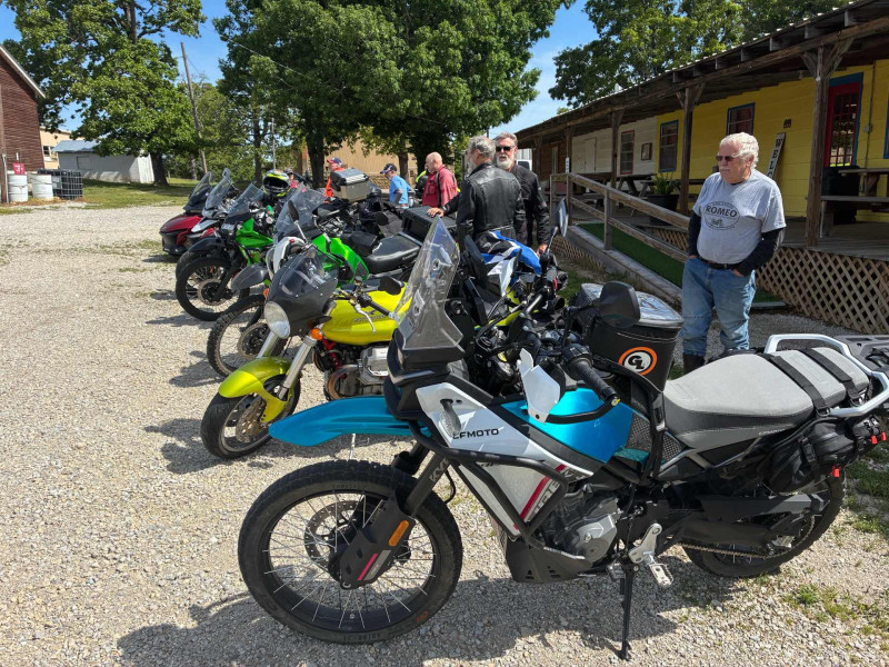 Neil couldn’t take his eyes off his V11. After trading Ron for his Lime Green Candy KLR .. he knows he's gonna miss that V11.
