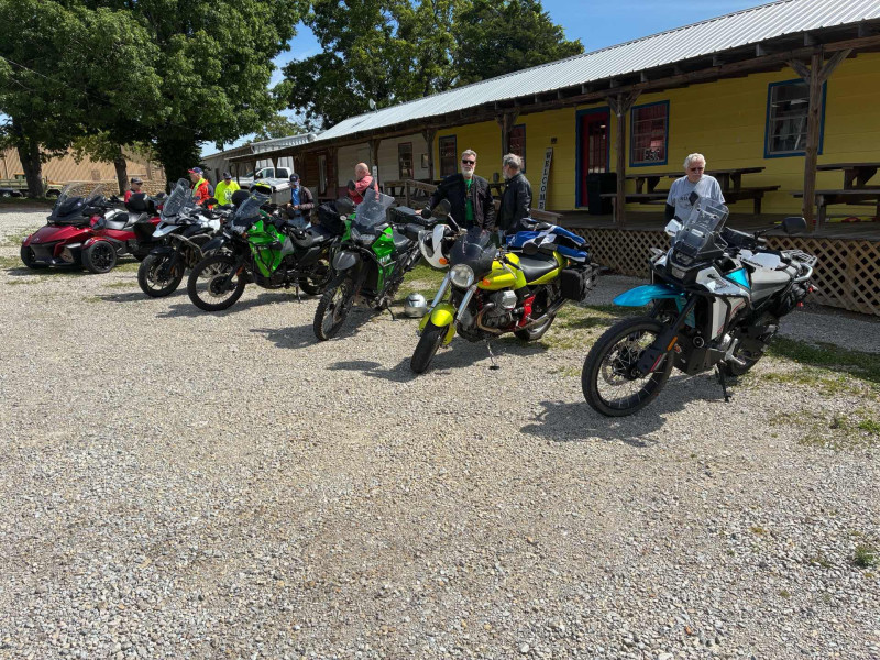 Just hanging out after a great lunch. So nice to see the two KLRs together. They just run and run !! I ain’t trading mine.