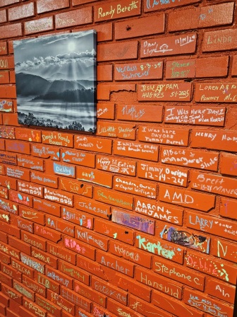 The wall bricks are (tastefully) signed.