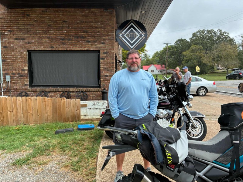 Darren in front of his modified black Harley. Good to visit with you today ! A Navy man of 22 years. Thank you for your service !!