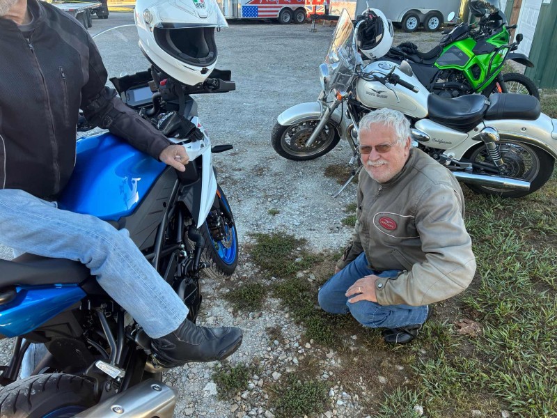 Neil was already trying to fix something on Mike Rowland’s brand new beautiful Suzuki V Twin 650. Neil thought that with a few motor mount tweaks, he could rotate his new engine 90 degrees to make it a transverse small block like his surplus of Guzzis. Just leave it alone Hoss.