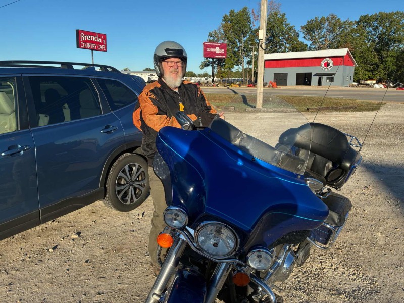 Joe guarding his spotless blue Harley. Joe is a regular at our rides.